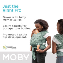 Moby Featherknit baby wrap worn with baby close during stroll