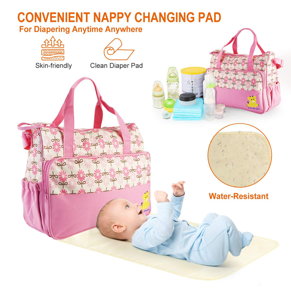 Moclever diaper bag pink highlighting side pockets for quick-access essentials.