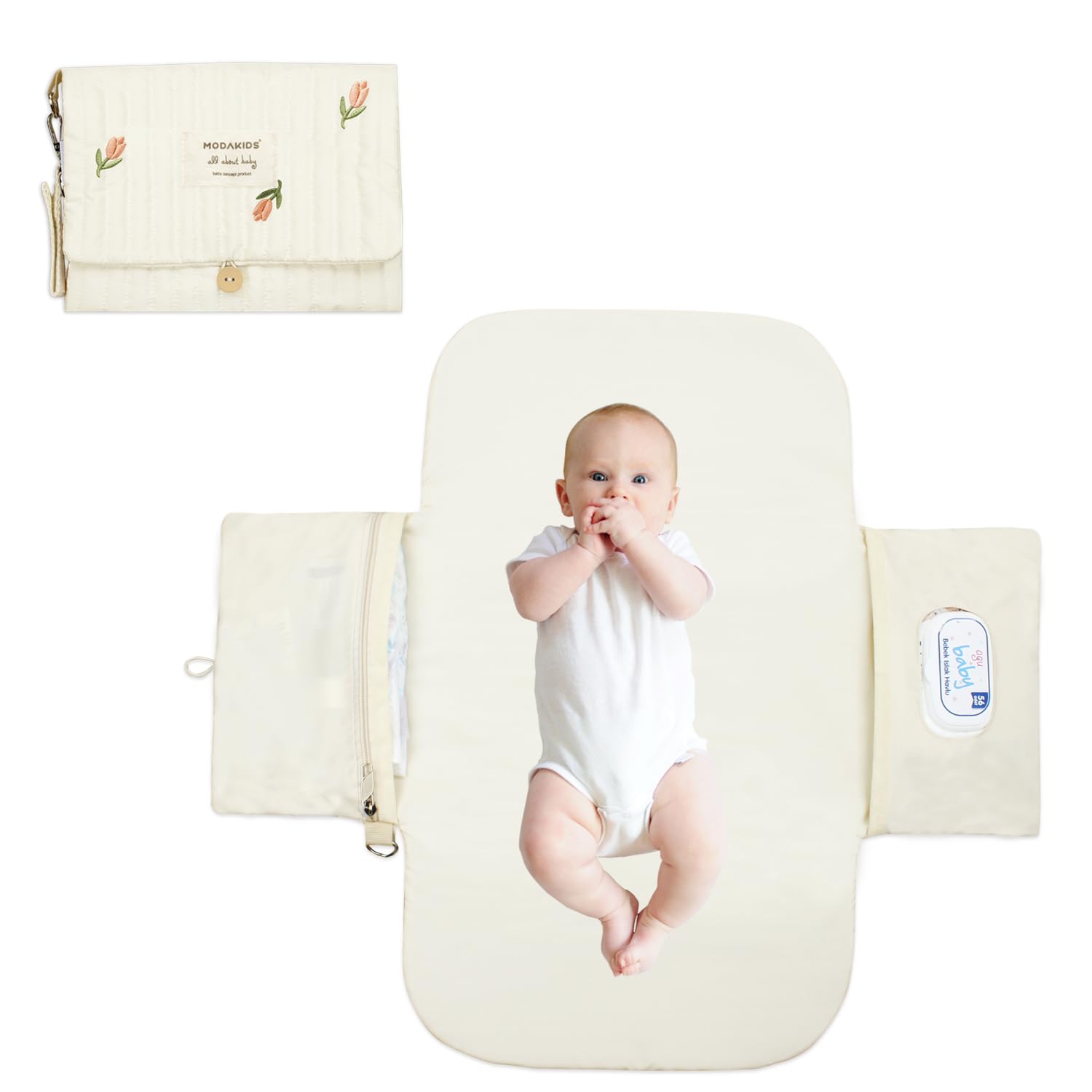 MODAKIDS portable diaper changing pad folded for travel convenience.