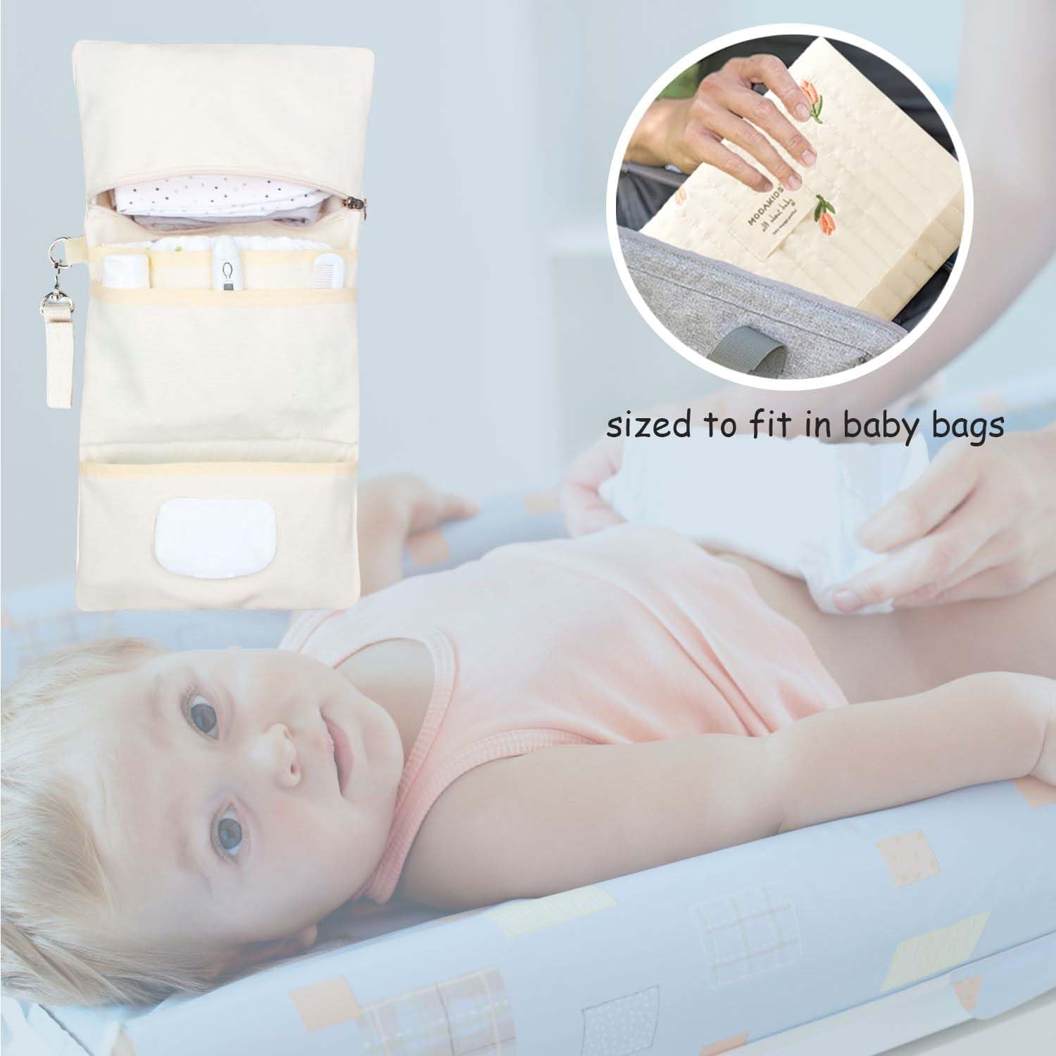 MODAKIDS stroller-strap attachment keeps baby essentials within reach.
