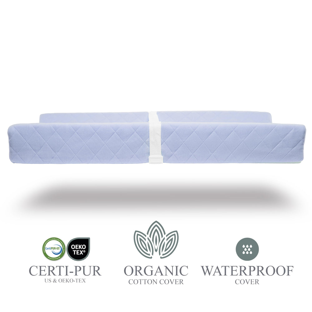 Modera changing pad cover closeup highlights removable organic cotton for easy care.