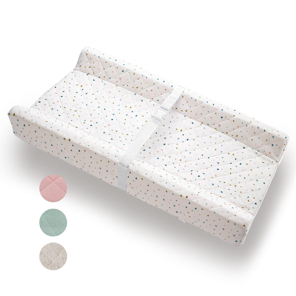 Modera Changing Pad Topper offers cushioned comfort for diaper changes.