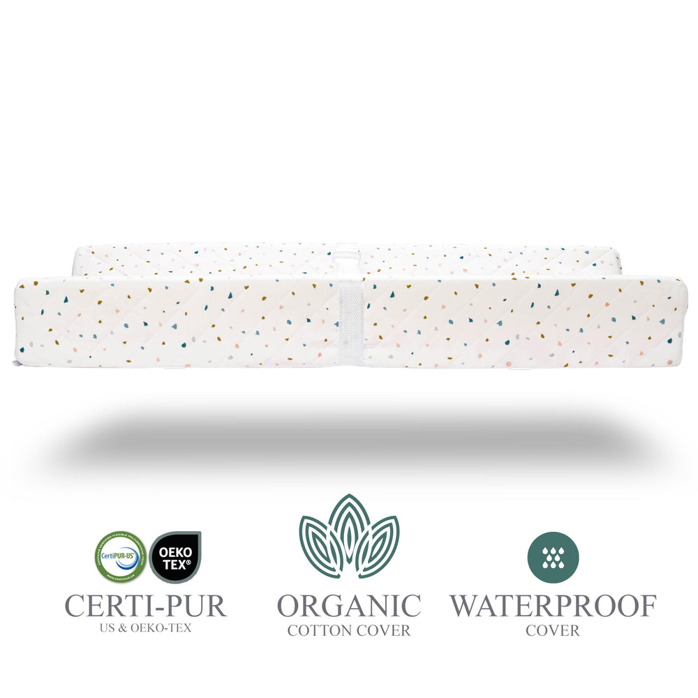 Modera Waterproof Mattress keeps surfaces clean and dry during diaper changes.
