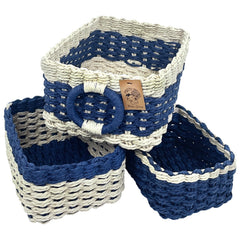 Modern Granny color blocks small wicker baskets weave closeup highlighting handwoven texture and eco-friendly fibers.