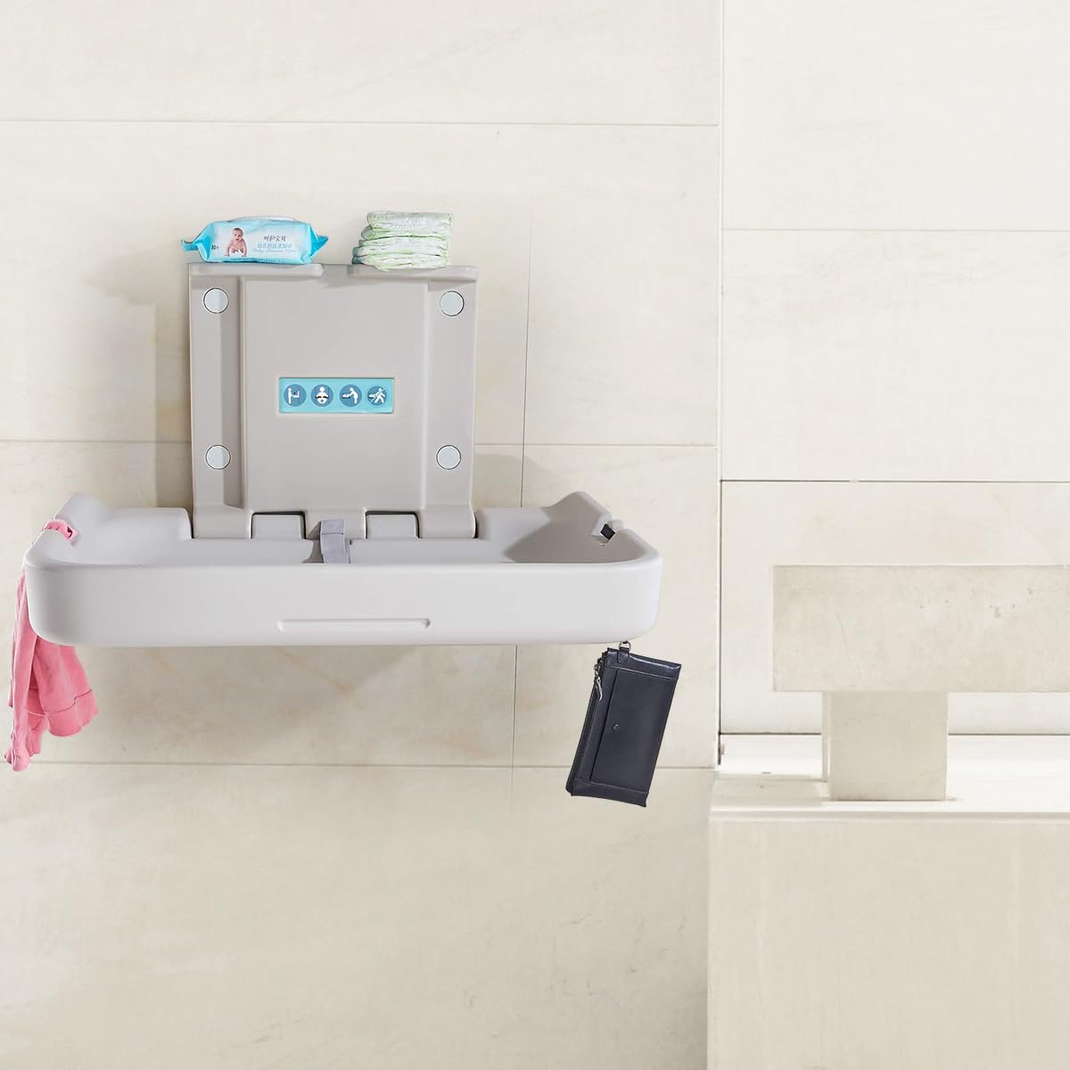 Modundry diaper bag hooks hold items off the floor for tidy restrooms.