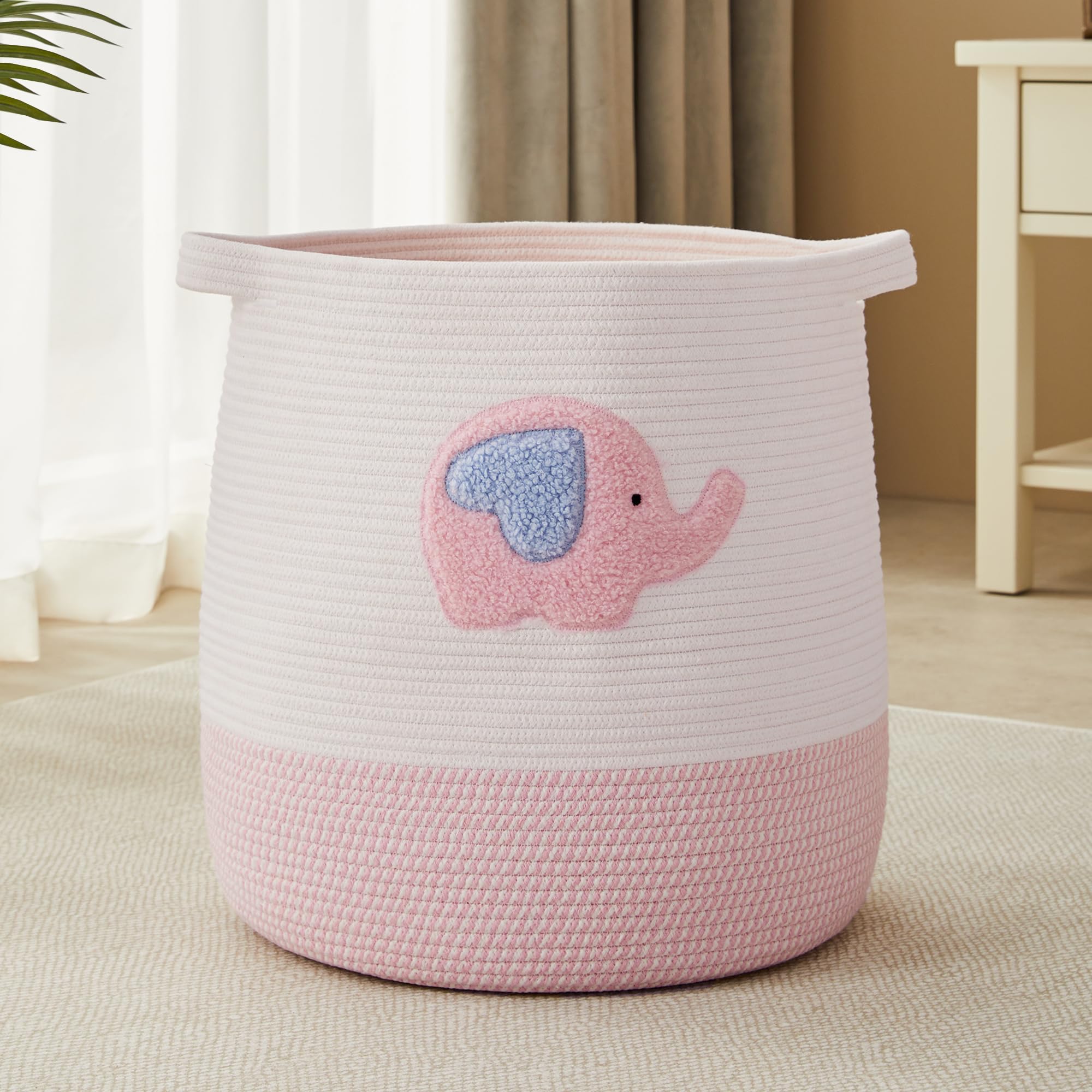 MOJOSCEND 65L pink elephant laundry basket front view shows large capacity for blankets and toys.