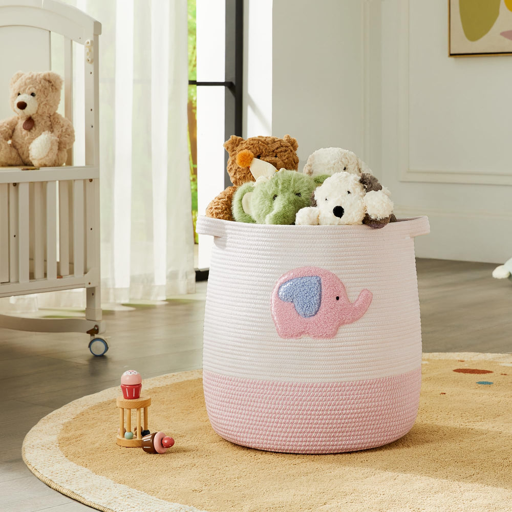 MOJOSCEND pink elephant laundry basket close-up of soft, sturdy handles for easy carrying.