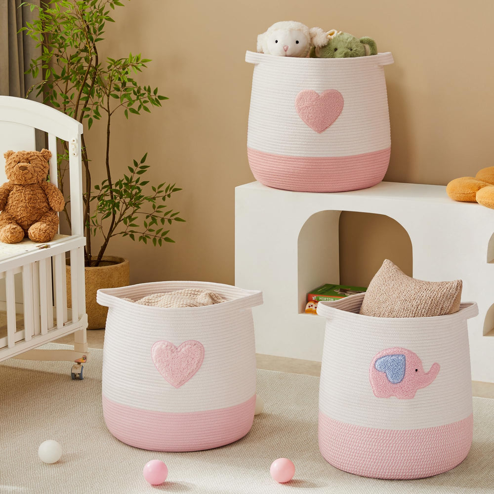 MOJOSCEND pink elephant laundry basket in bedroom matching decor.