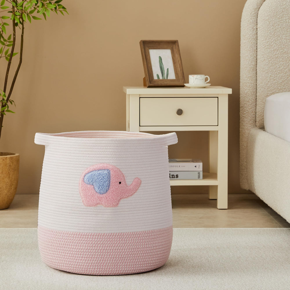 MOJOSCEND pink elephant basket with blankets illustrating spacious storage.