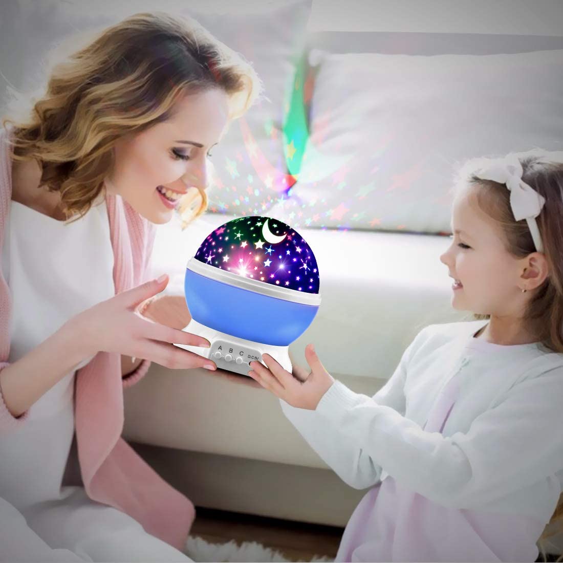 MOKOQI star projector emits blue glow for calming ambience.