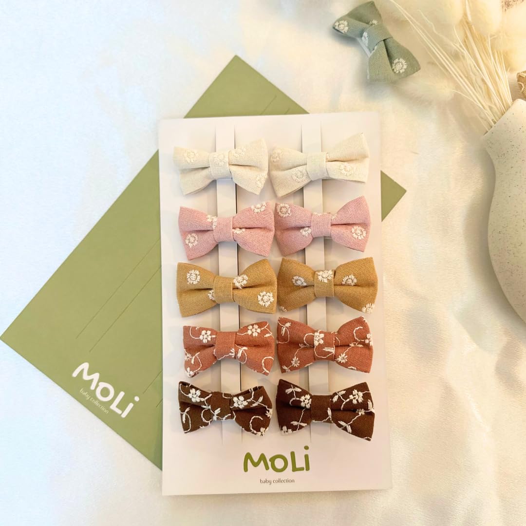 MoLi Baby Collection 10-piece floral bow clips in autumn tones for easy daily styling.