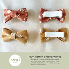 MoLi Baby Collection floral embroidered cotton fabric highlights delicate craftsmanship and soft texture.