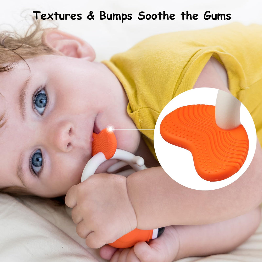 Mombella clownfish teether clip-on attachment demonstrates anti-drop design for on-the-go peace.