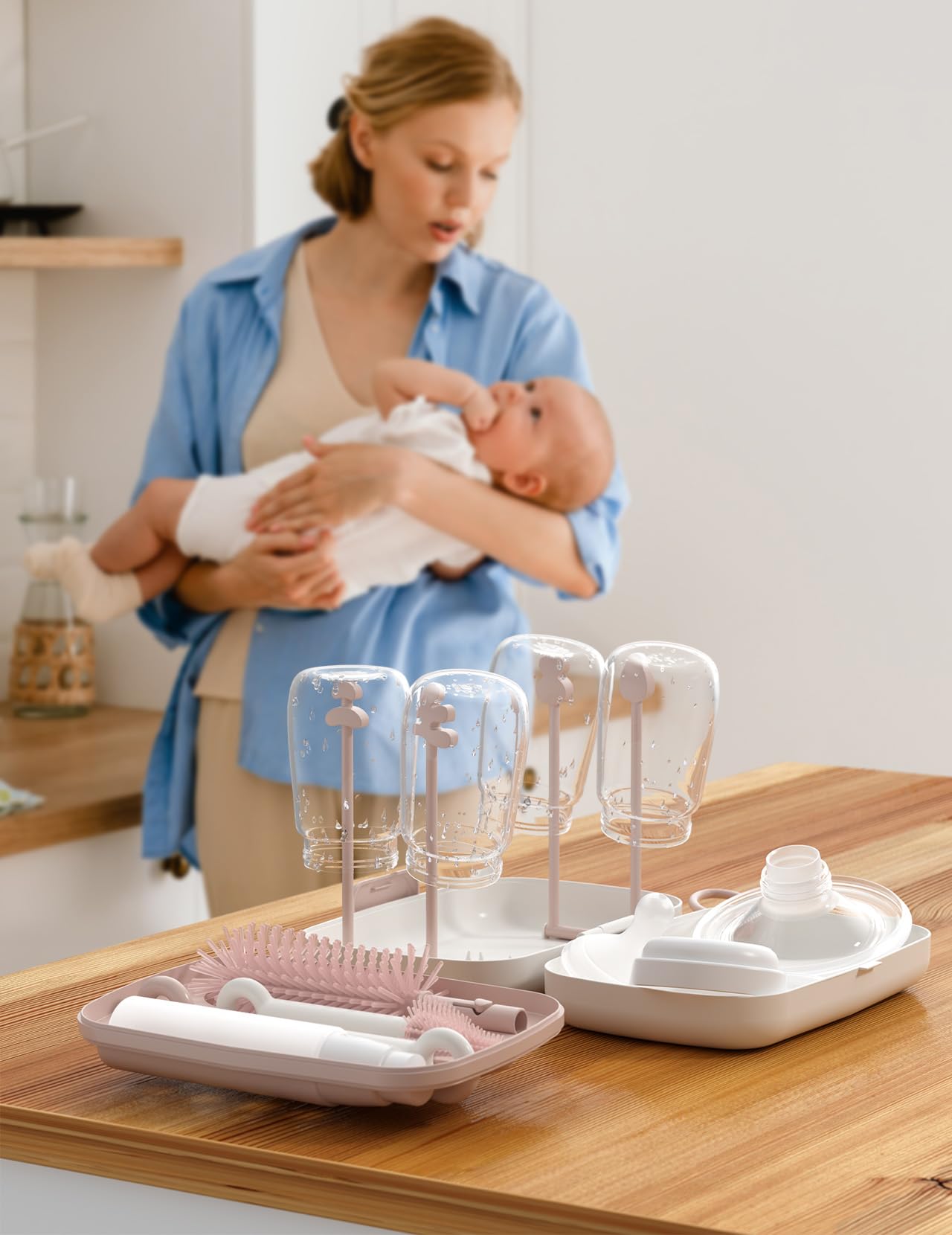 Momcozy kit cleans pump parts and teethers between uses.