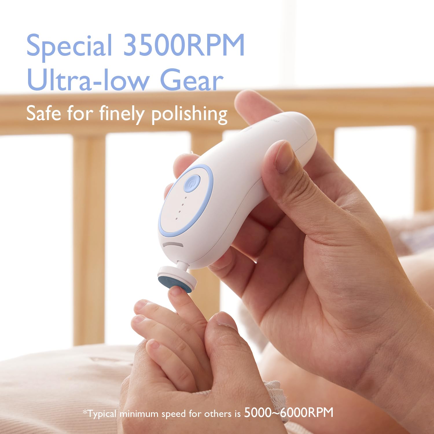 Momcozy Nail File Electric blue in-hand use showing comfortable control.