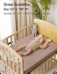 Momcozy crib sheet inner corners prevent ripping for durable wear.