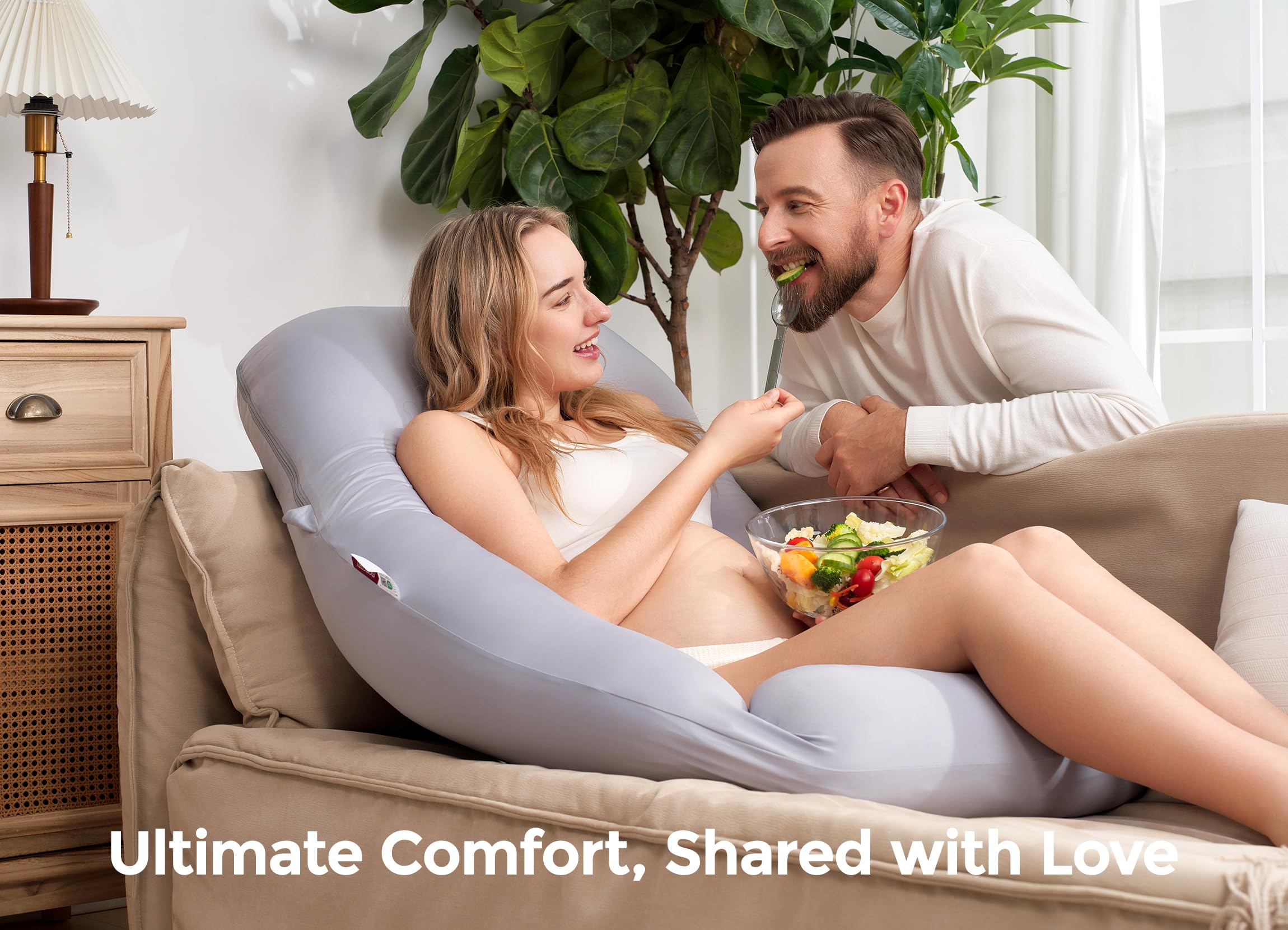 Momcozy Dreamlign U Pro pillow supports back, hips, and belly for restful sleep.