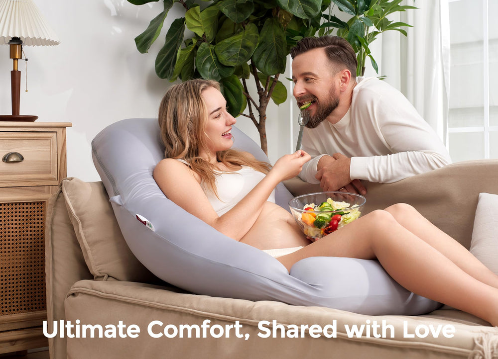 Momcozy Dreamlign U Pro pillow supports back, hips, and belly for restful sleep.