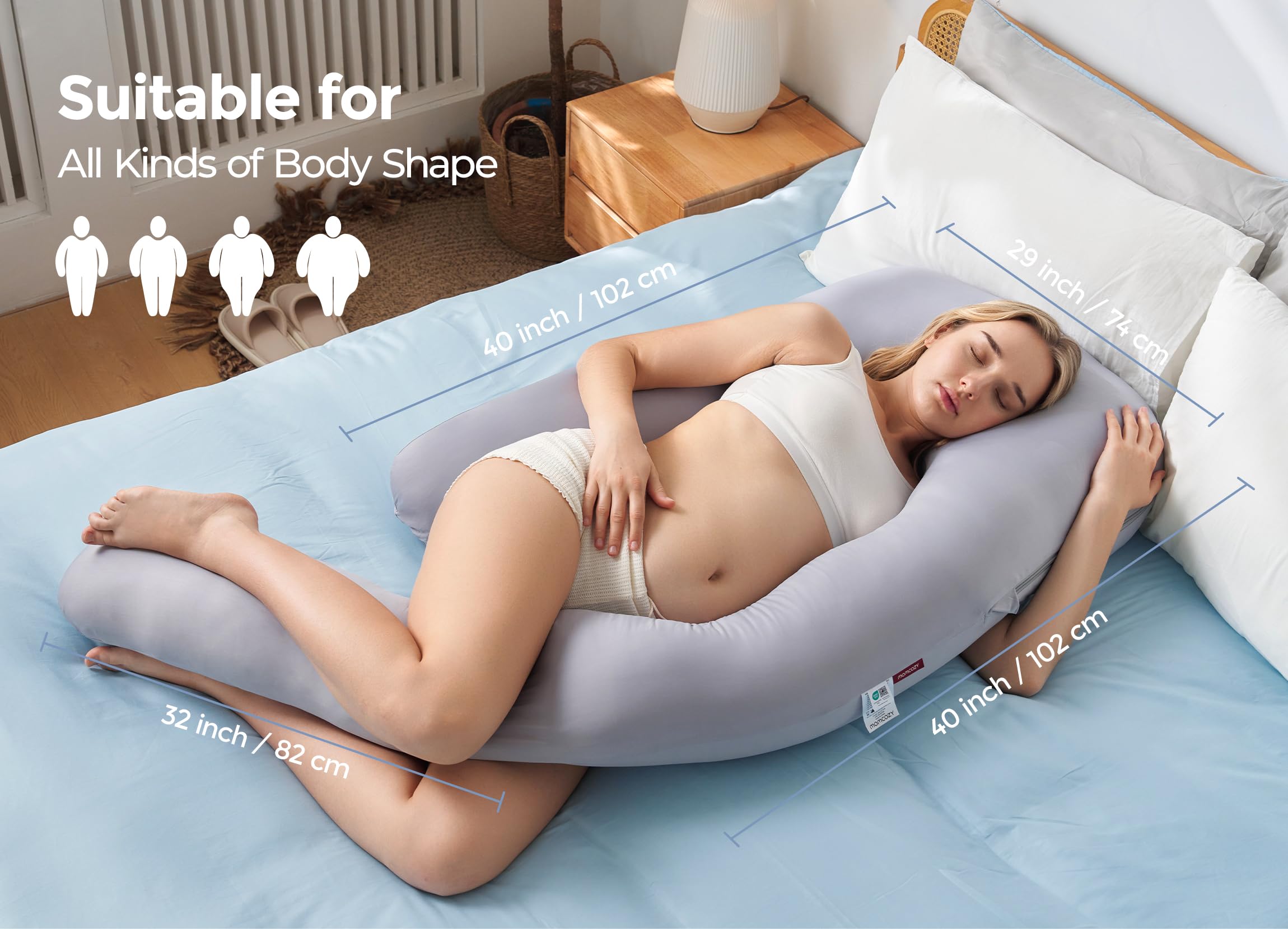 Momcozy Dreamlign U Pro pillow in use at bedtime for side sleeping comfort.