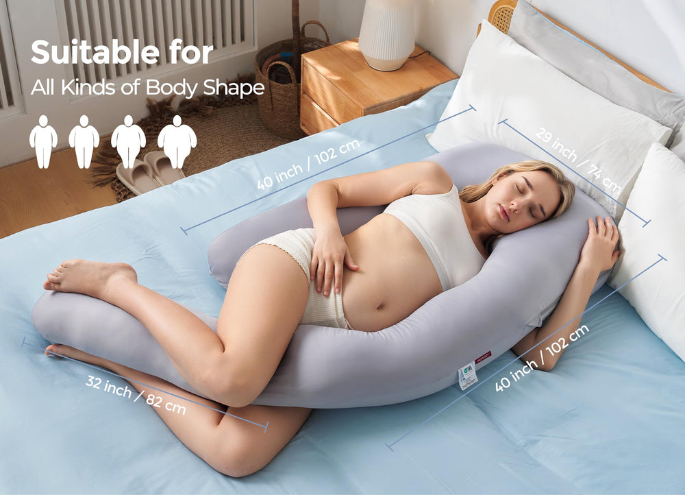 Momcozy Dreamlign U Pro pillow in use at bedtime for side sleeping comfort.