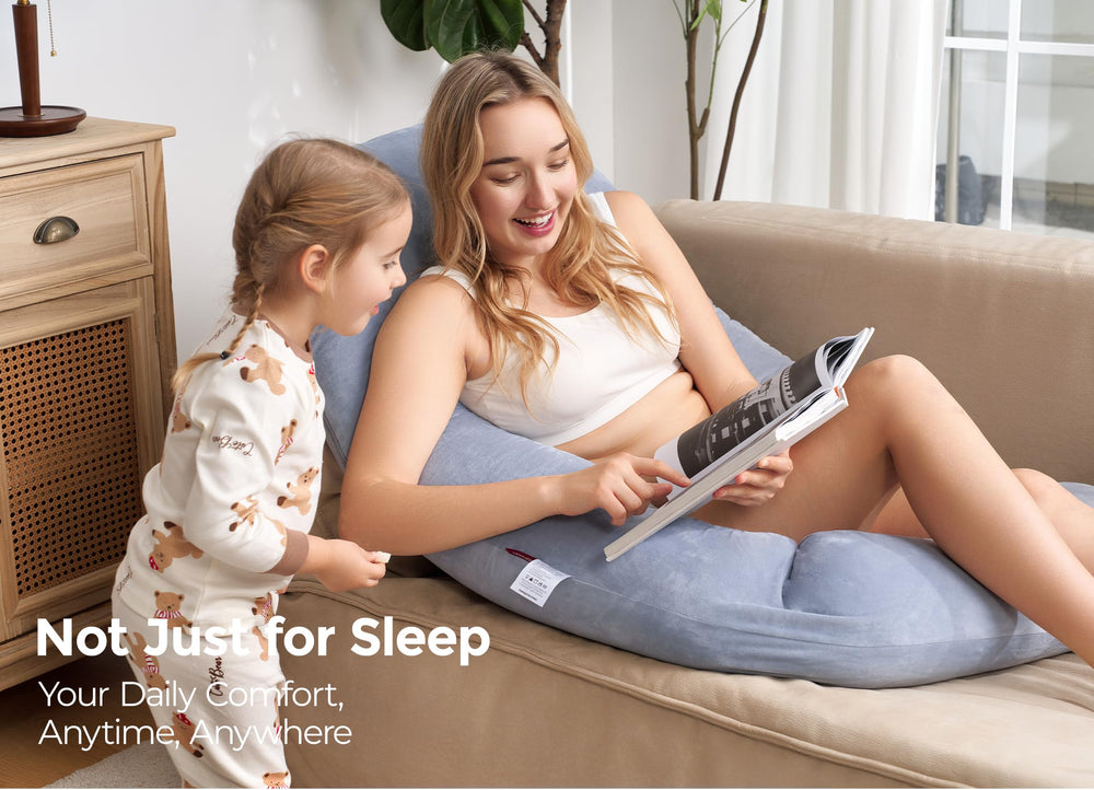 Momcozy Dreamlign U Pro in-use shot suggests multi-position comfort for reading.