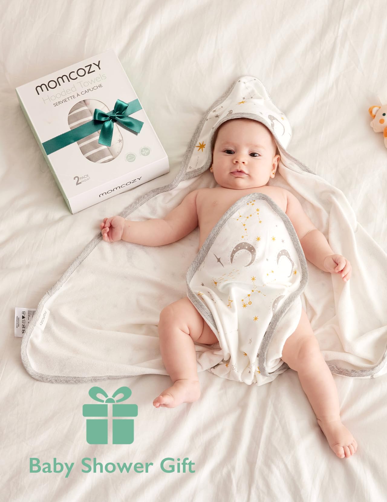 Momcozy easy-care towel spread flat demonstrates quick washing and fast drying.