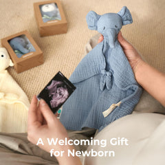 Momcozy Elephant Lovey knotted corners featured for tiny hands' exploration.