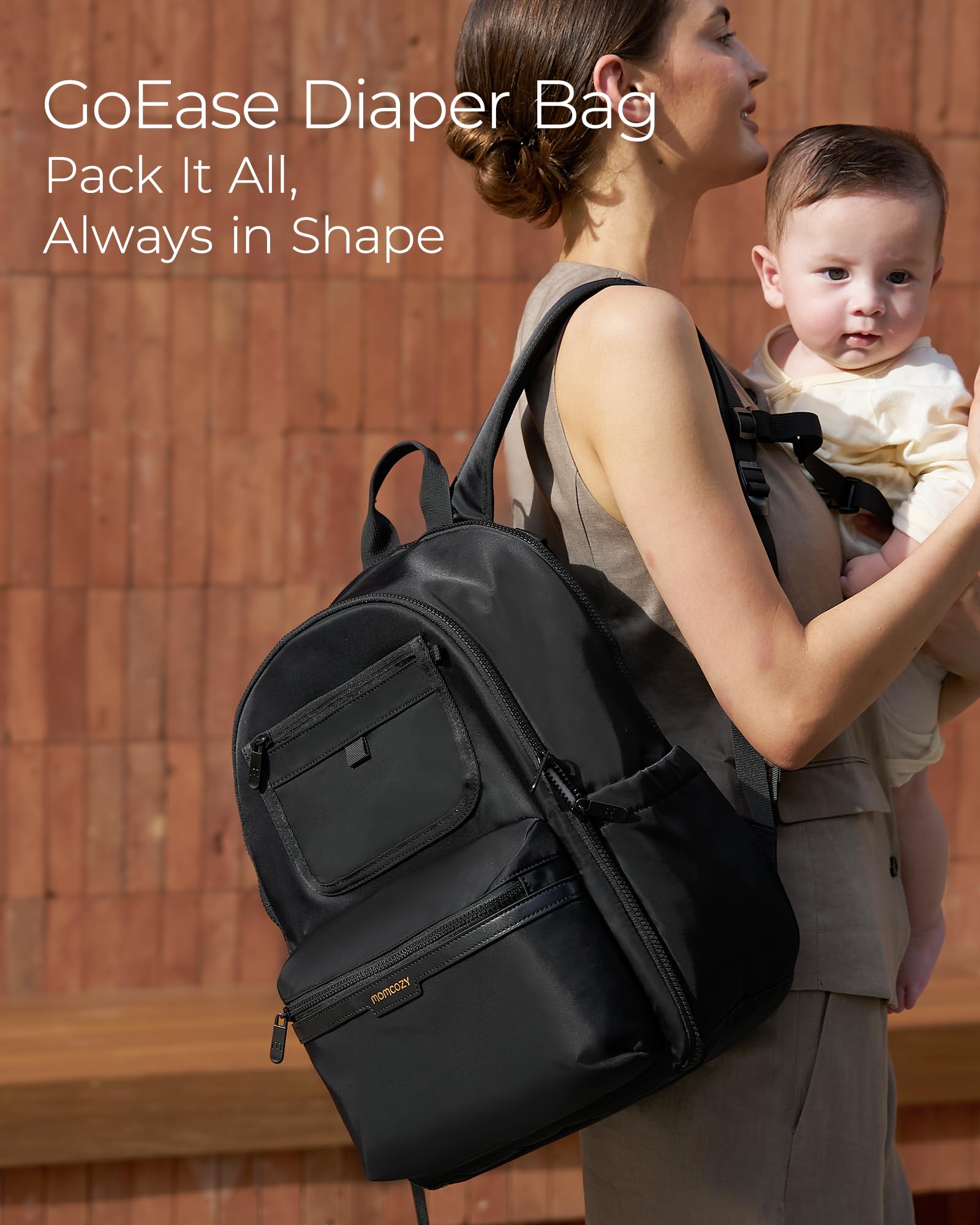 Momcozy GoEase laptop compartment keeps work devices organized on the go