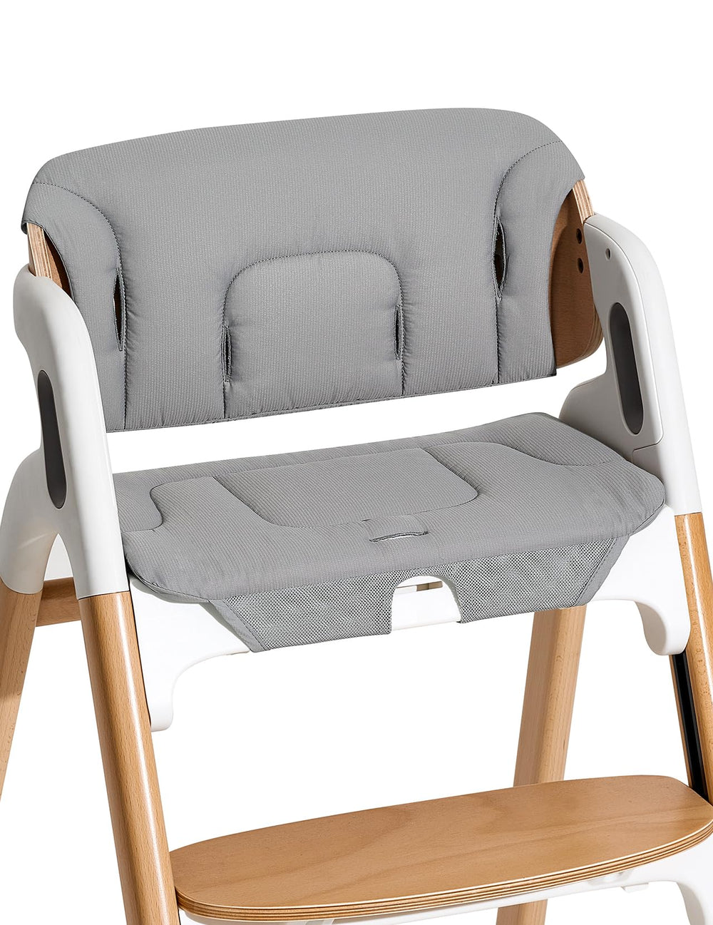 Momcozy machine-washable seat pad simplifies cleanup after meals.