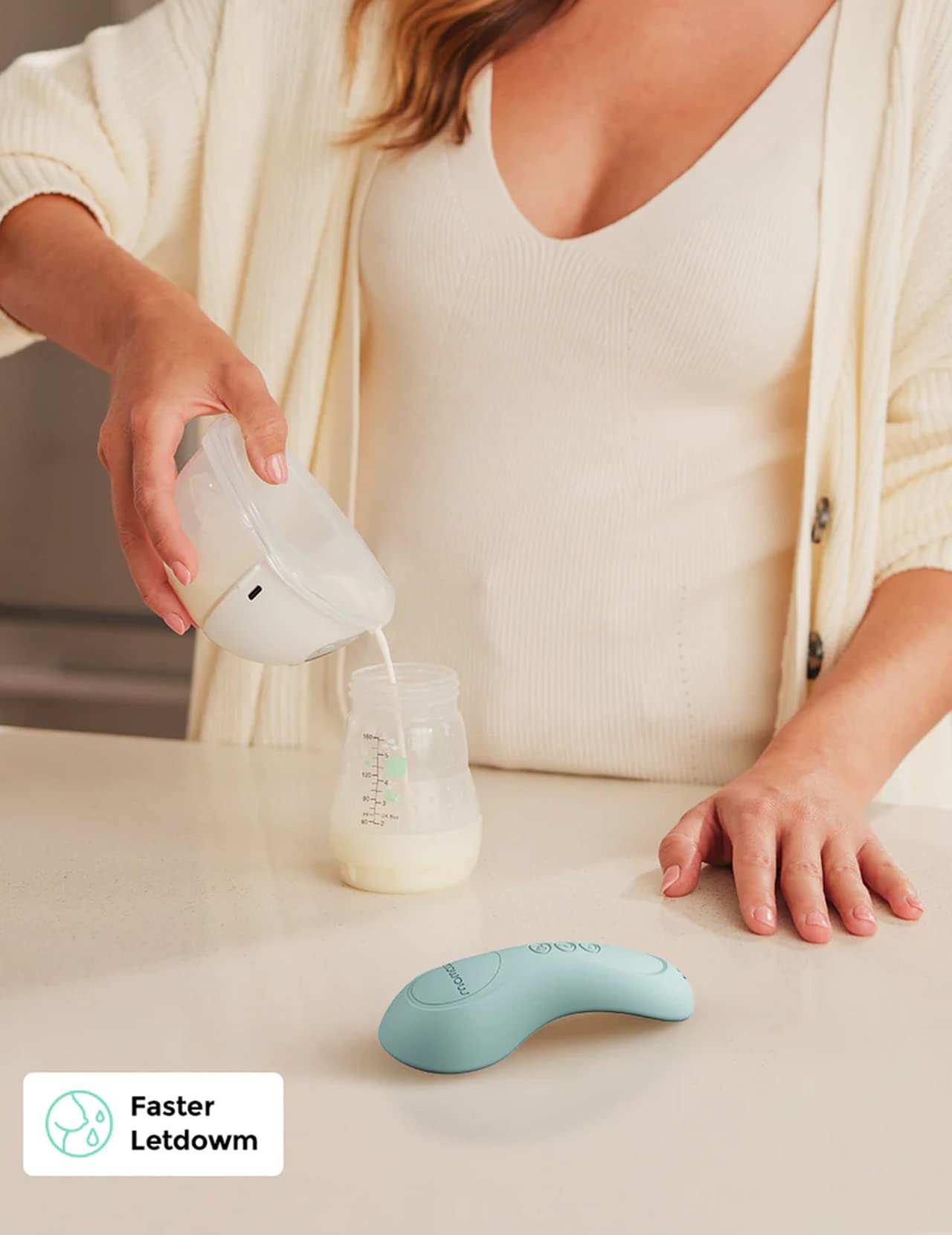 Compact Momcozy massager fits in a bra for discreet, on-the-go use.