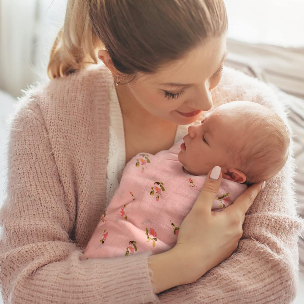 Momcozy multiuse swaddle blanket used as nursing cover.