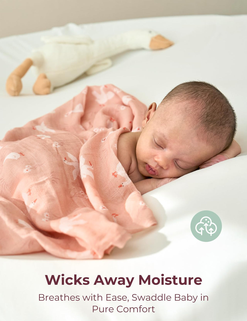 Wrapped baby demonstrates secure swaddle from Momcozy for smoother sleep transitions