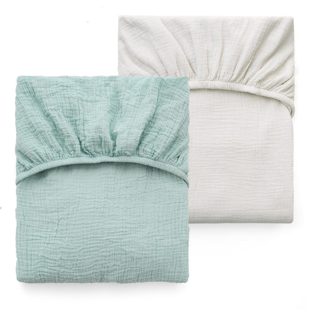 Momcozy crib sheet corner-detail shows reinforced corners for lasting use.