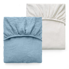 Momcozy muslin fitted crib sheet 52x28 pack shows a soft breathable surface for baby sleep.