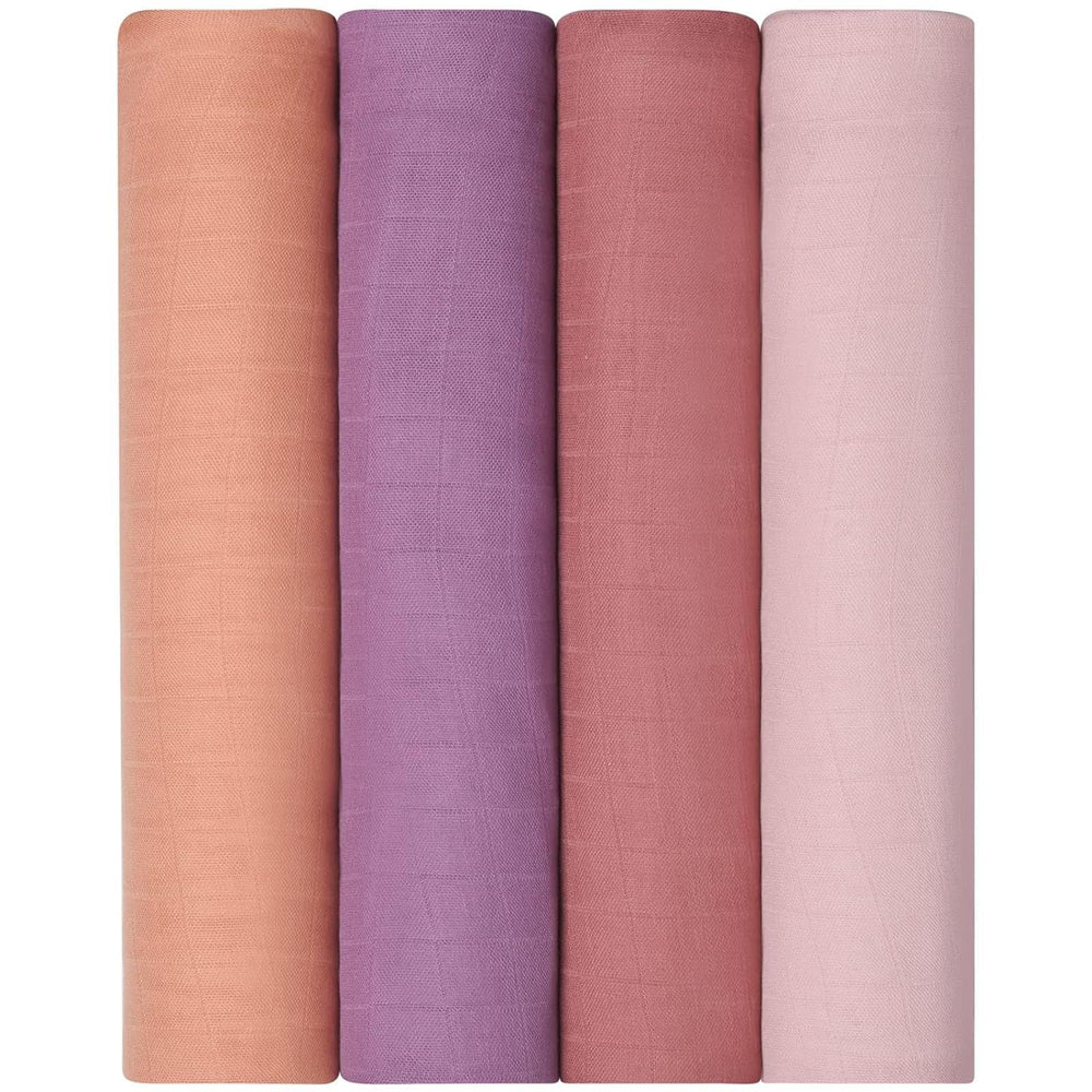 Earth-tone Momcozy blankets coordinated with baby outfits.