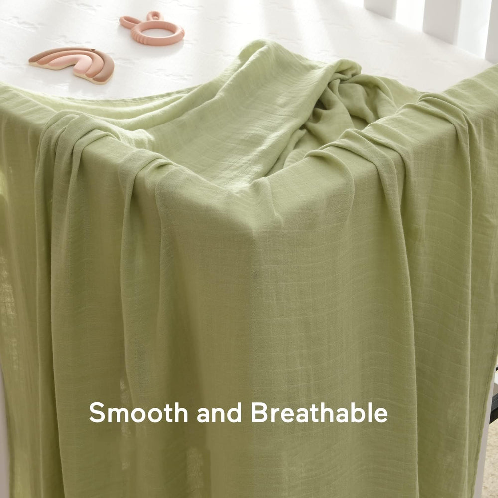 Momcozy Muslin Swaddle Blanket breathable fabric for all-day comfort.