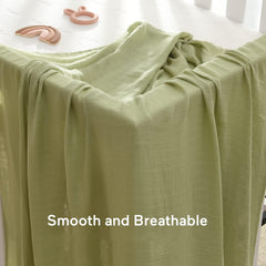 Momcozy Muslin Swaddle Blanket breathable fabric for all-day comfort.
