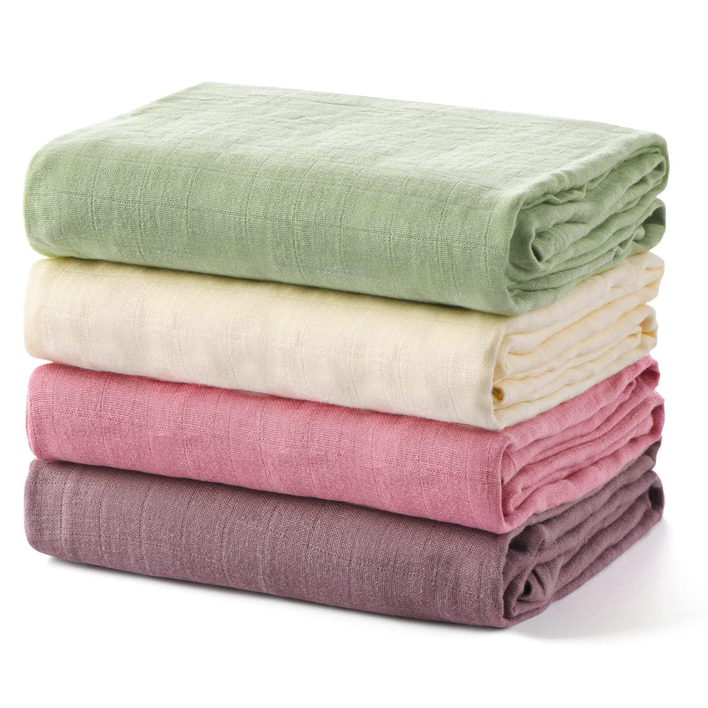 Momcozy Muslin Swaddle Blanket soft closeup for gentle newborn comfort.