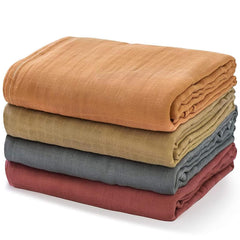 Momcozy muslin swaddle blanket soft texture highlights gentle touch for newborn skin