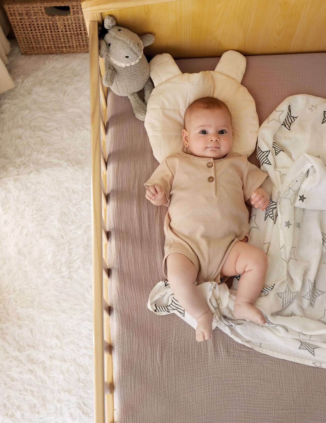 Momcozy neutral color options coordinate with any nursery decor.