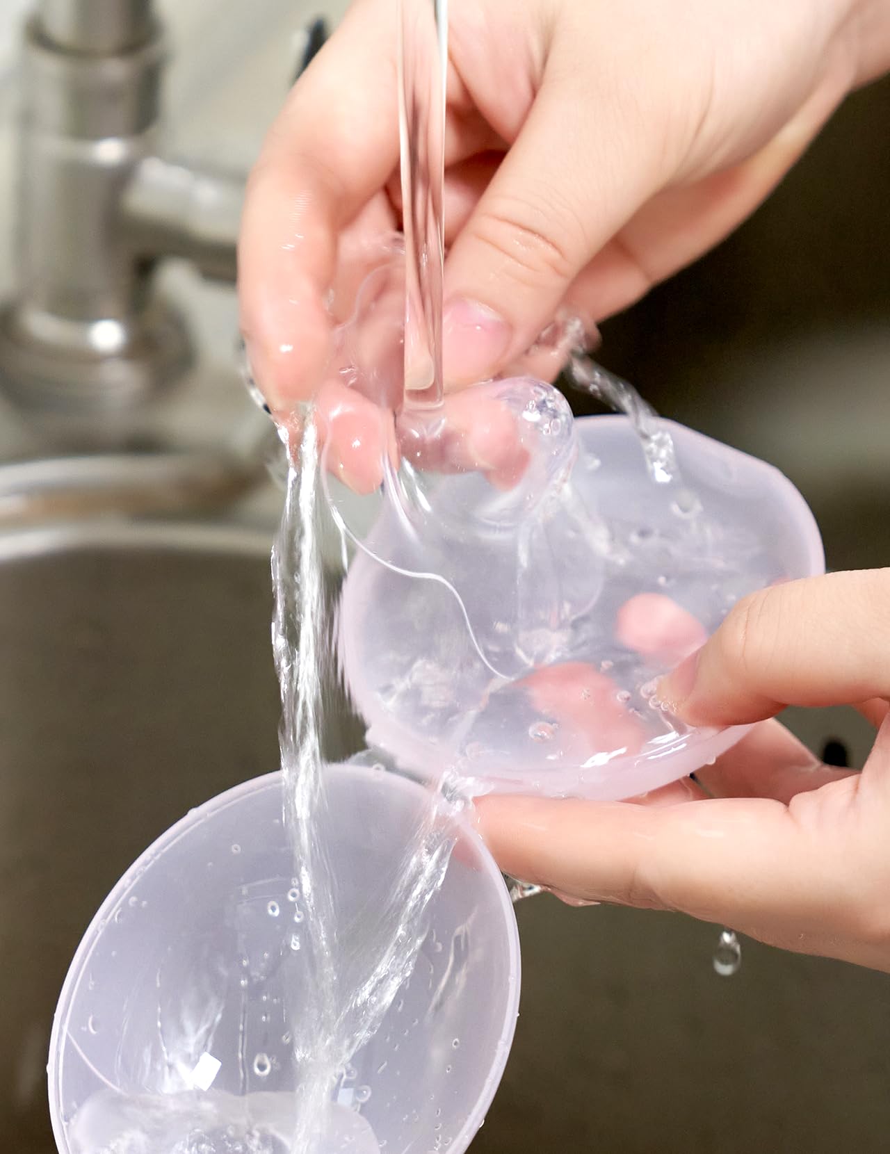 Compact reusable shield set is portable for on-the-go nursing with Momcozy.