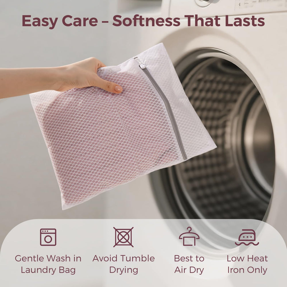 Momcozy pink nursing cover is machine washable for easy care