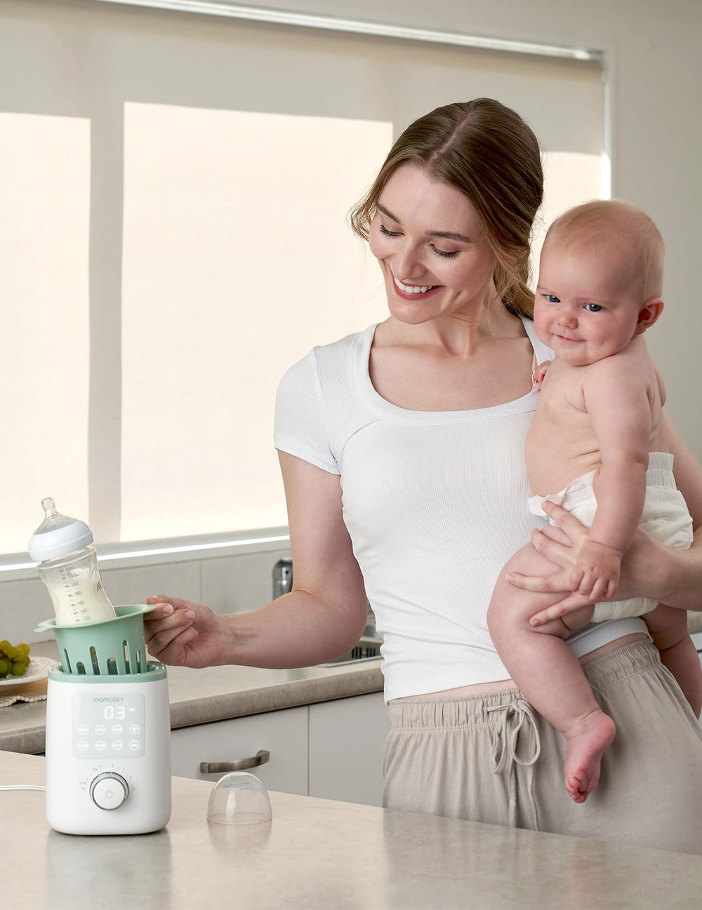Momcozy Nutri bottle warmer compatible with most bottles and pouches