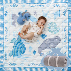 Momcozy Ocean Play Mat folded with carrying handle, portable for travel and outdoor picnics.