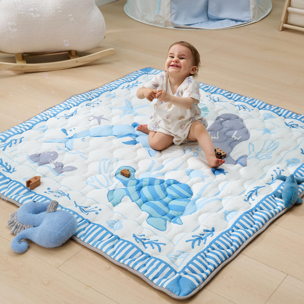 Momcozy Ocean Play Mat with waterproof surface for easy cleanups.