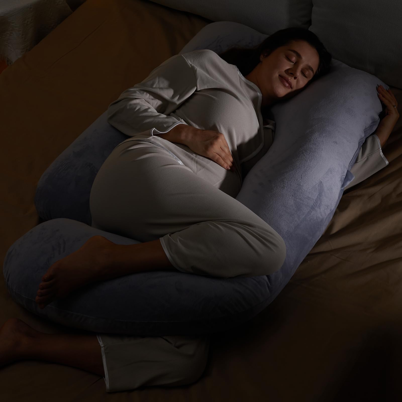 Momcozy pregnancy pillow removable cover close-up shows easy-clean design.