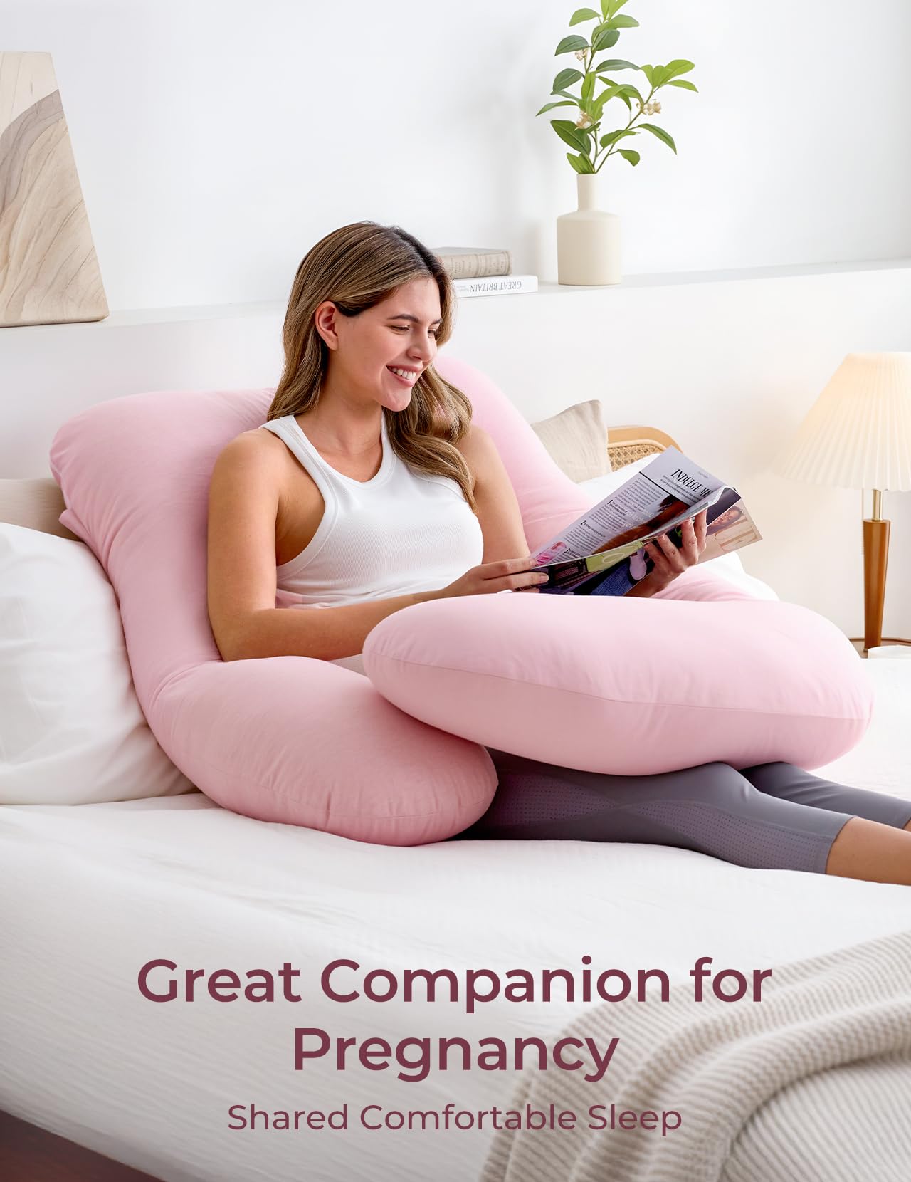 Momcozy pregnancy pillow back support view demonstrates relief for lower back tension