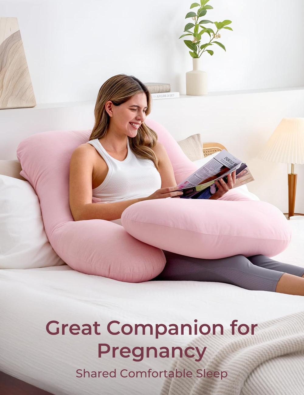 Momcozy pregnancy pillow back support view demonstrates relief for lower back tension