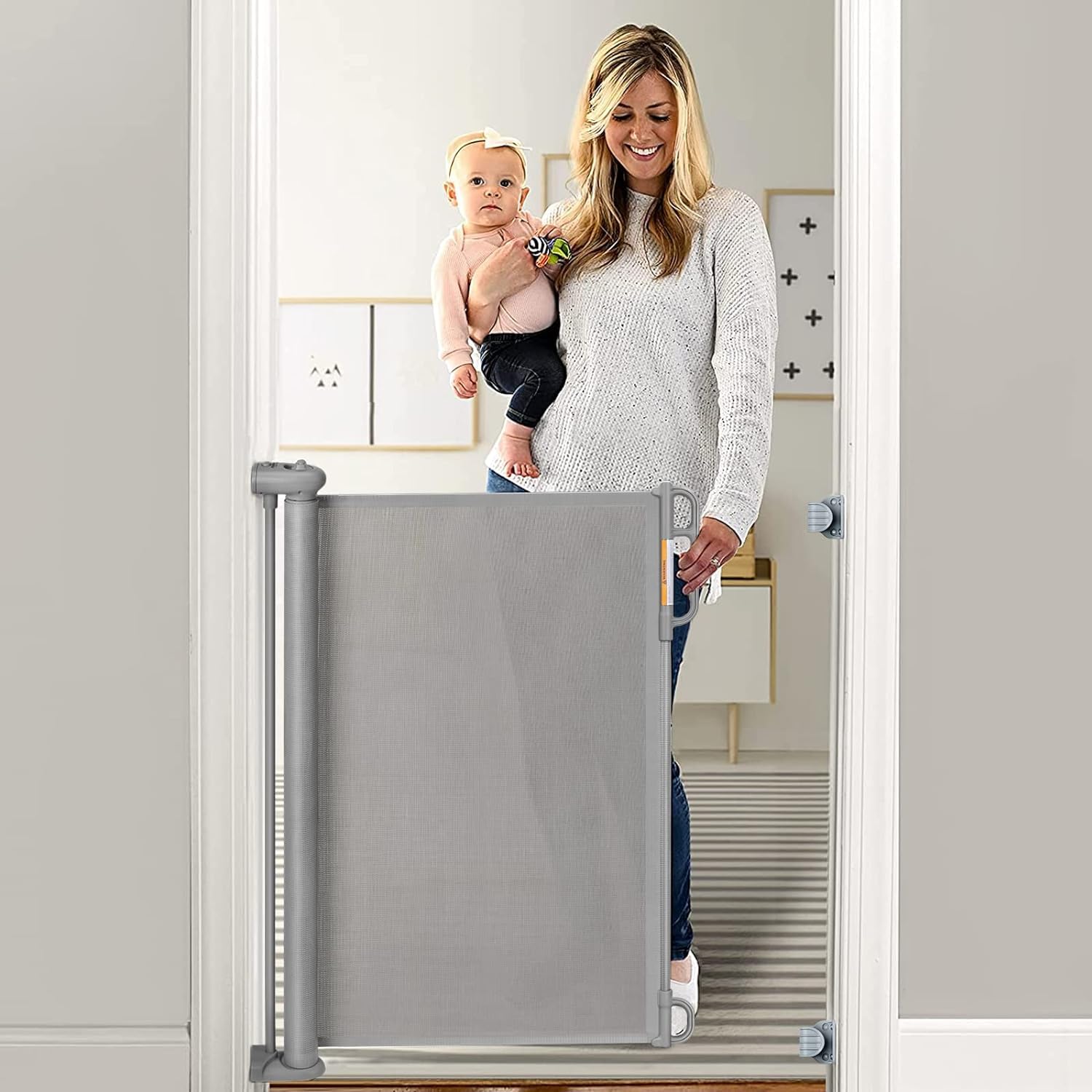 Momcozy retractable gate extended in doorway for wide opening safety