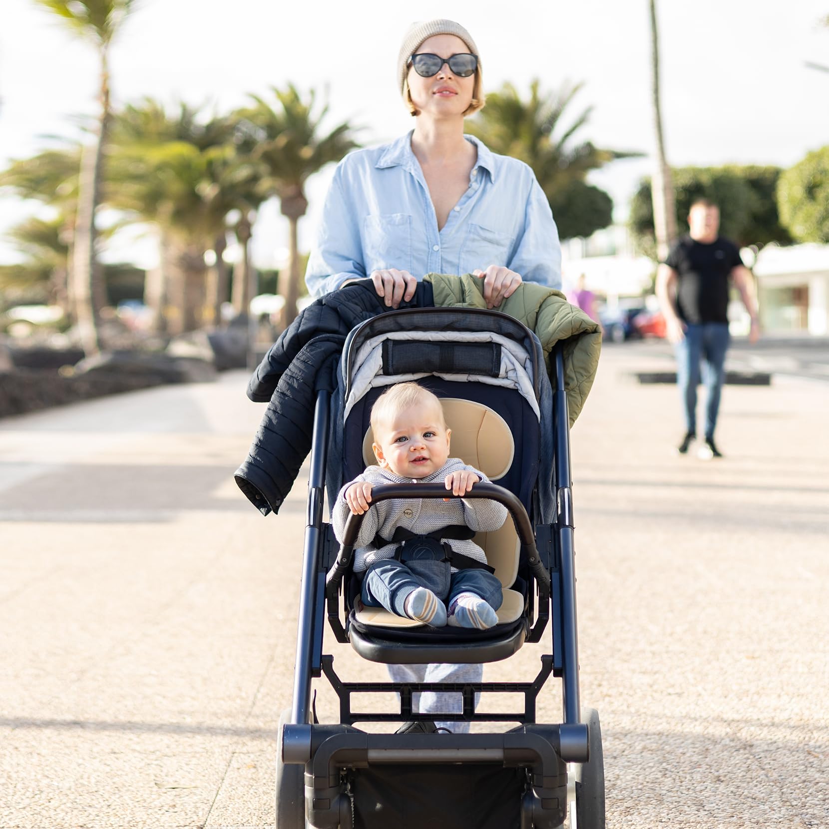 Momcozy breathable seat liner reduces sweat buildup for calm rides.